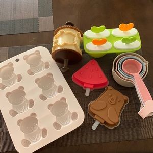 Plastic measuring cups and spoons, plus Holiday Cookie Cutters, ice cream tools